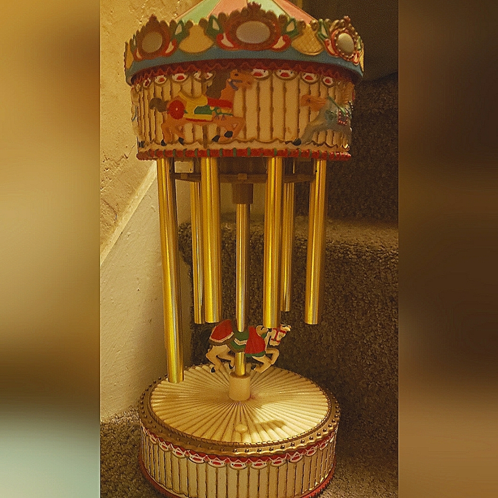Vintage musical carousel by Avon